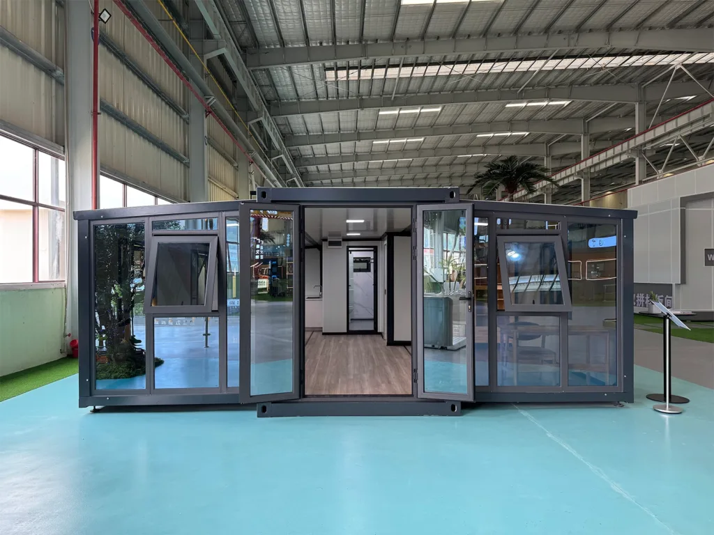 Night view with lights of 30ft Dual-Wing Expandable Container House