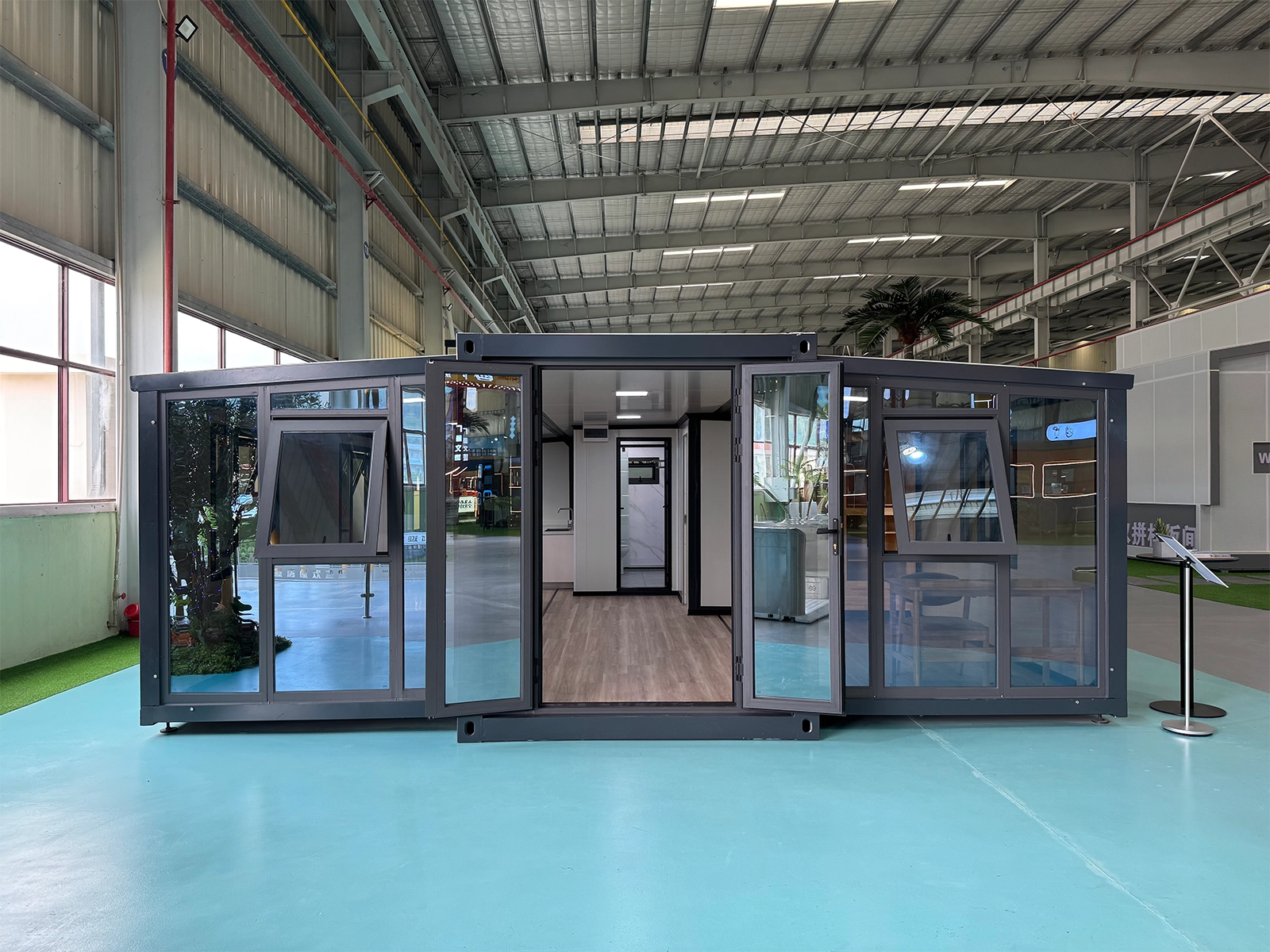 Night view with lights of 30ft Dual-Wing Expandable Container House