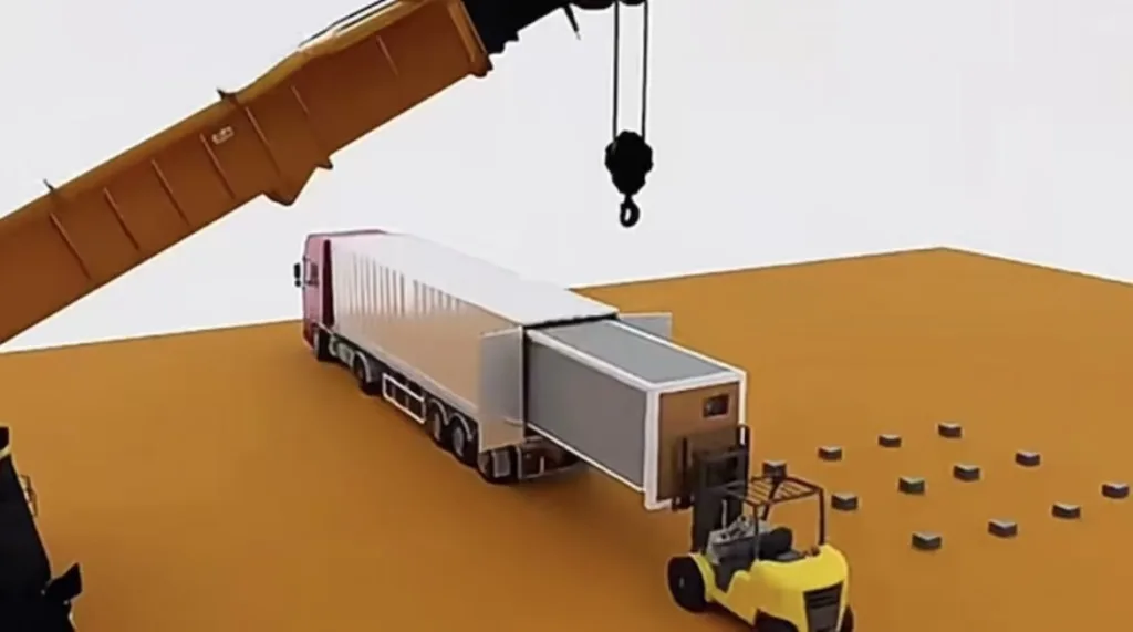 Folded expandable container housing loaded for transport to next site