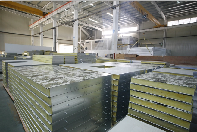 Insulated container home wall system with vapor barrier for energy efficiency