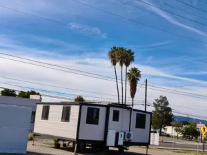 8 Expandable Container House Applications: From Backyard Living to Mining Camps | GS Housing 12 Expandable container house application in urban backyard setting