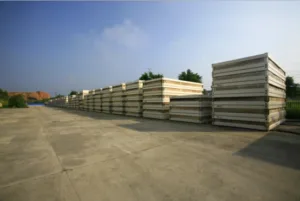 Stacked folding modular container houses in factory ready for bulk delivery