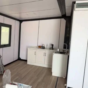 Aruba Expandable Container House Project--GS Housing 7 Interior view of expandable container house in Aruba showing modern residential layout and living space (2)