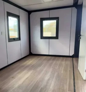 Aruba Expandable Container House Project--GS Housing 6 Interior view of expandable container house in Aruba showing modern residential layout and living space (4)